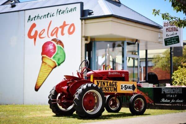 Farming vehicle advertising a vintage museum