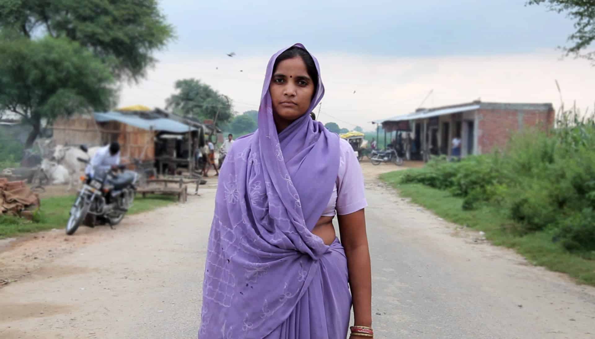 indian woman standing in street