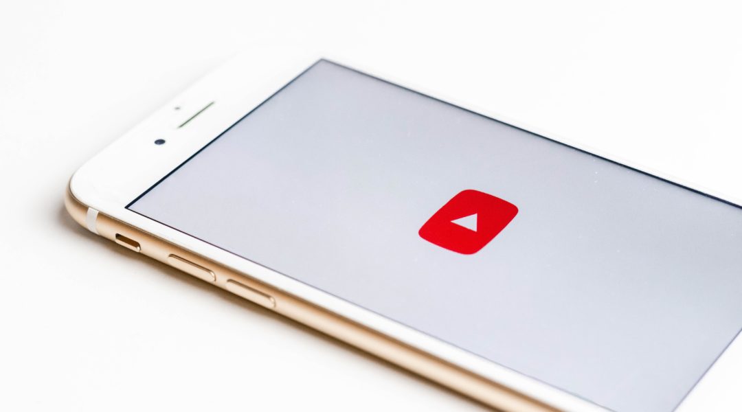 iphone with the youtube app icon